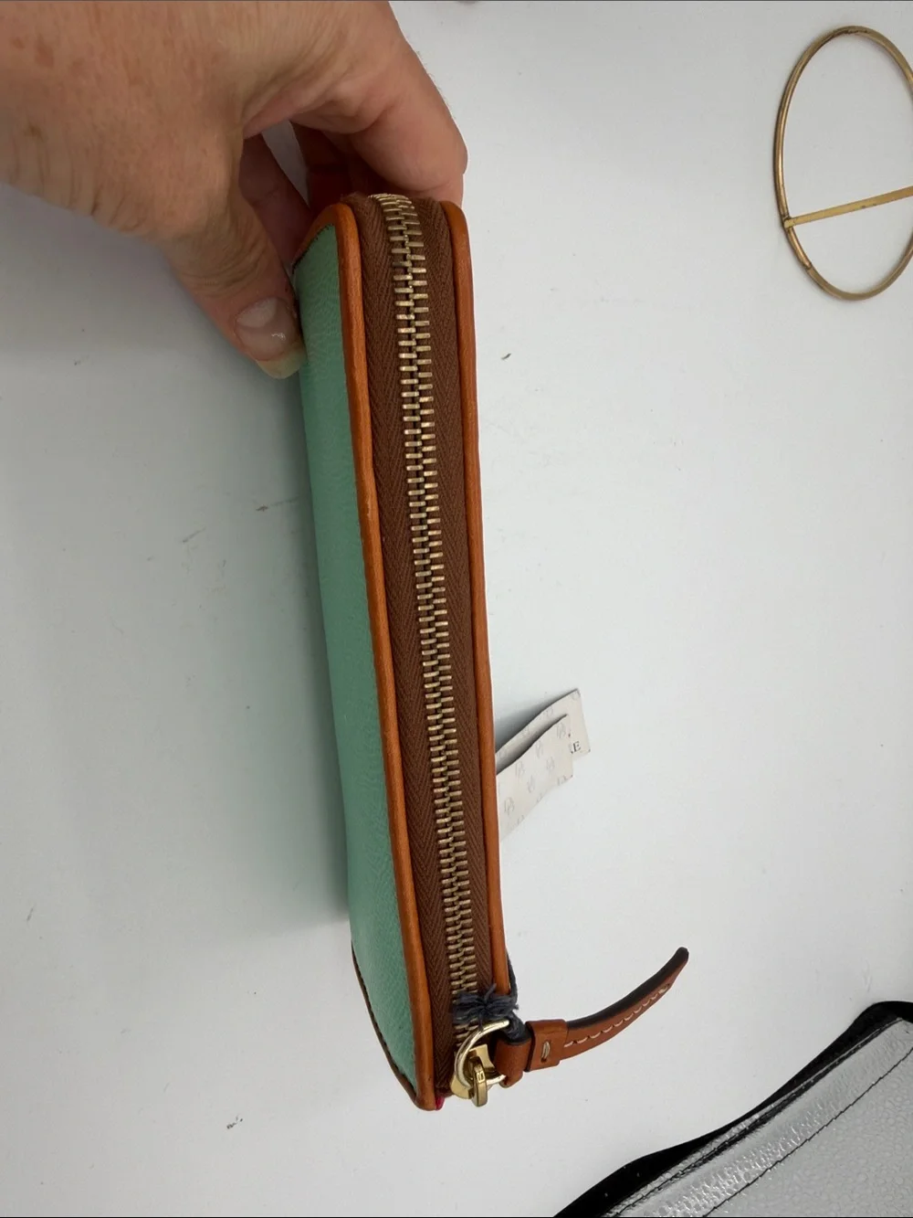 Dooney & Bourke Turquoise Zip-Around Wallet with Tan Trim and Gold Logo